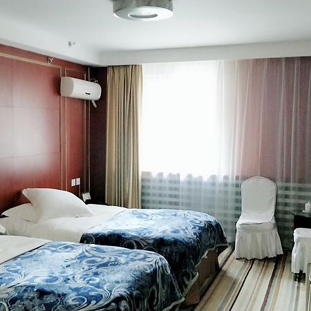 Tianzhi Hotel Harbin Esterno foto